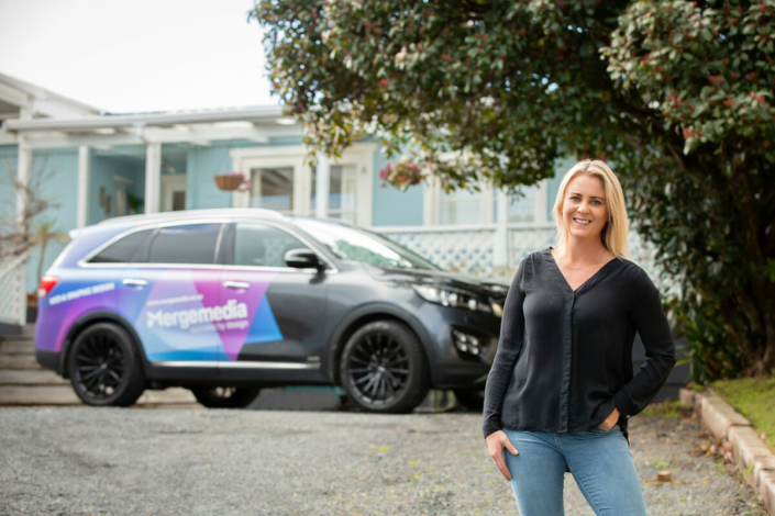 image of Renee and the Merge Media car in Beachlands